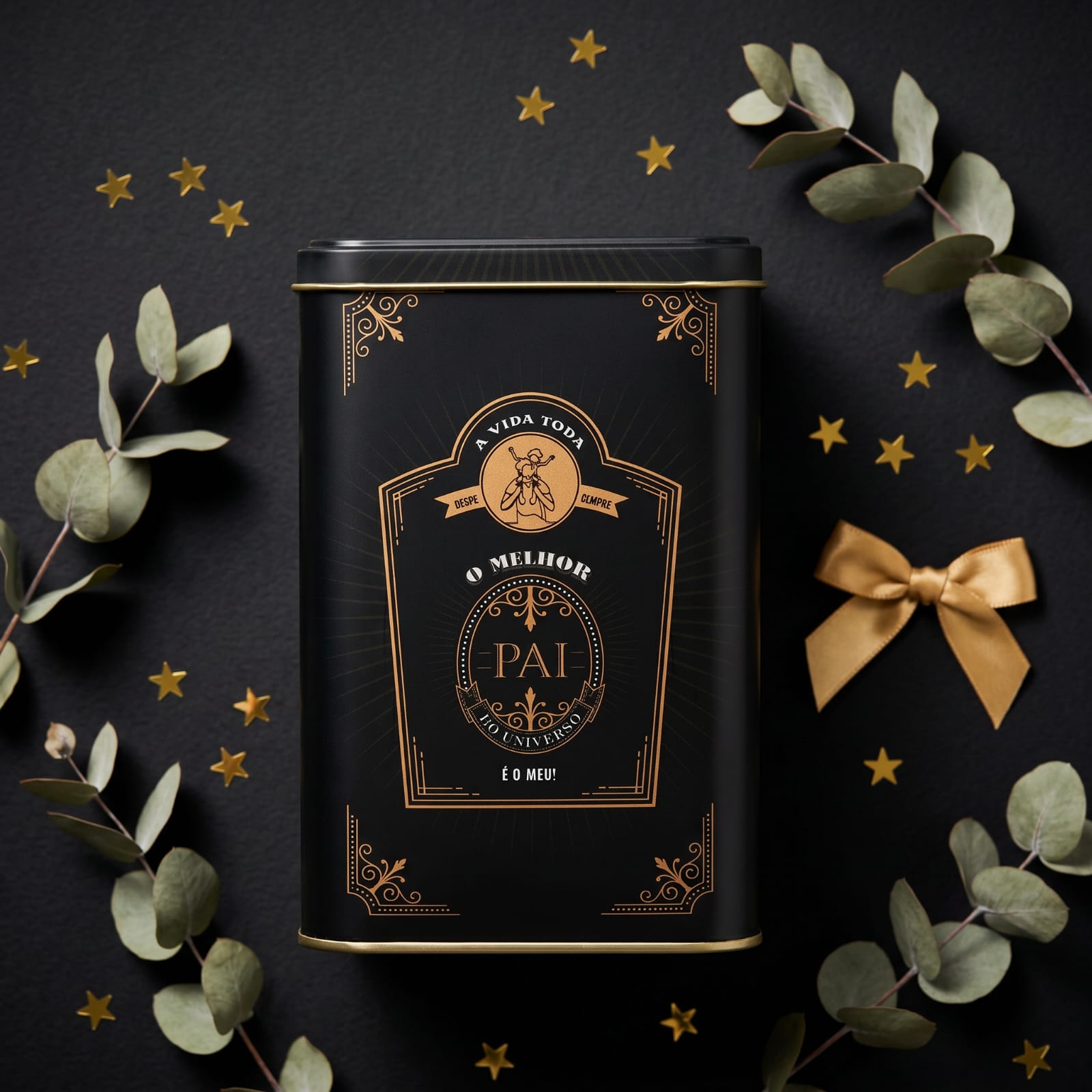 Lata Pai Preta Retangular com rótulo dourado 'O melhor pai do universo é o meu', laço dourado e folhas de eucalipto
